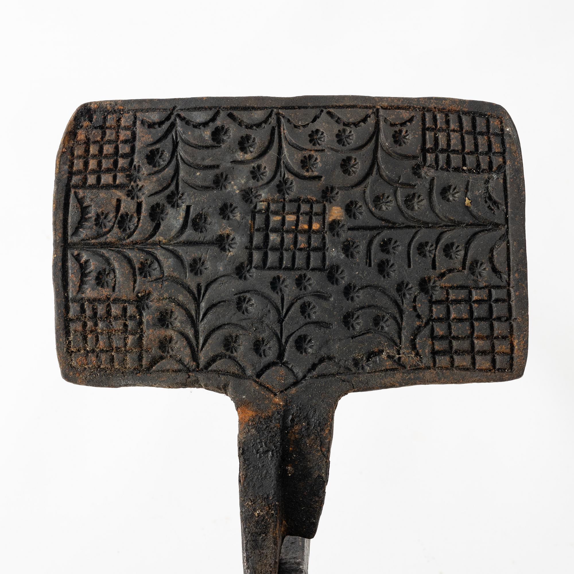 A Swedish waffle iron, 18th century.