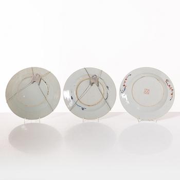 A group  of three serving dishes, a serving bowl, a cup, and seven plates, porcelain, including China 18th century.