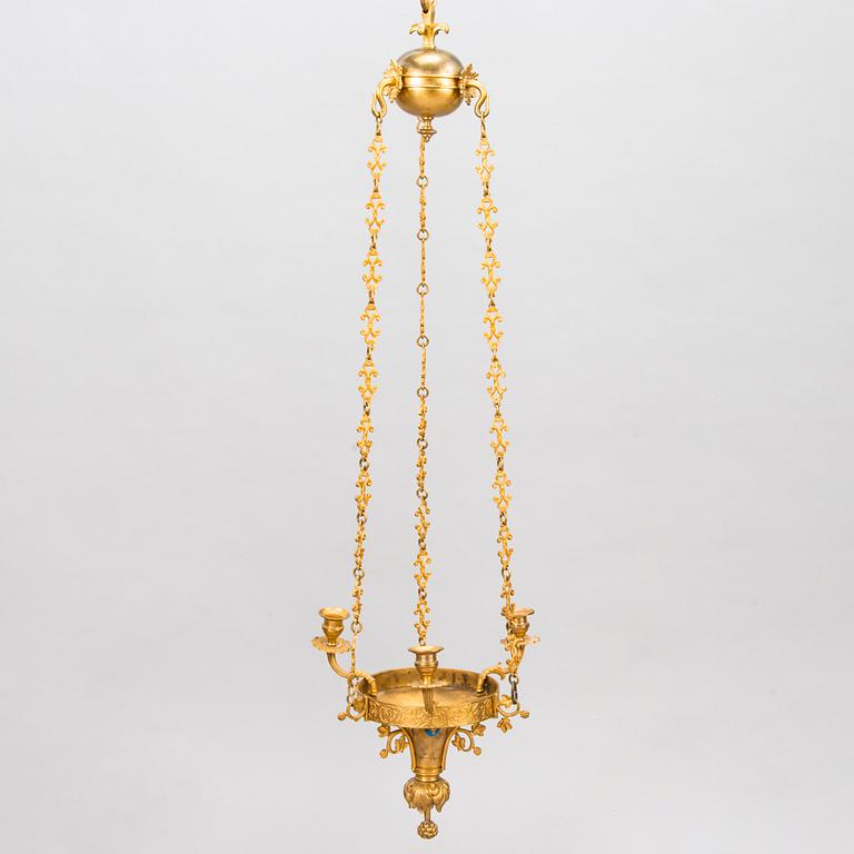 A brass hanging basket, 19th century.