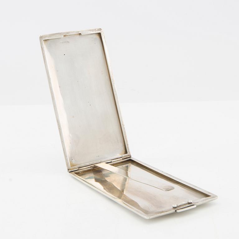 American silver cigarette case with engraving from World War II.