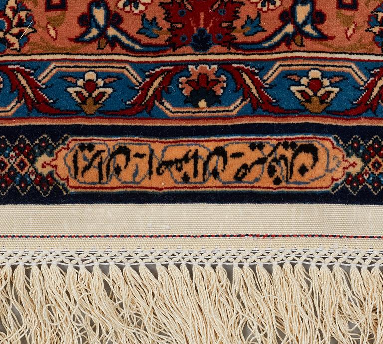 A CARPET, an old Isfahan, ca 347 x 252 cm (+ the ends have 3 and 2,5 cm flat weave).