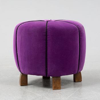A 1940's table with pouf.
