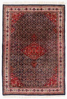 An oriental carpet, c. 283 x 194 cm.