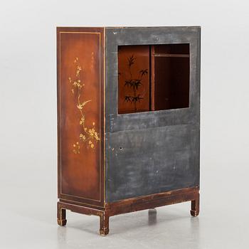 A Chinese style cabinet, later part of the 20th cwentury.