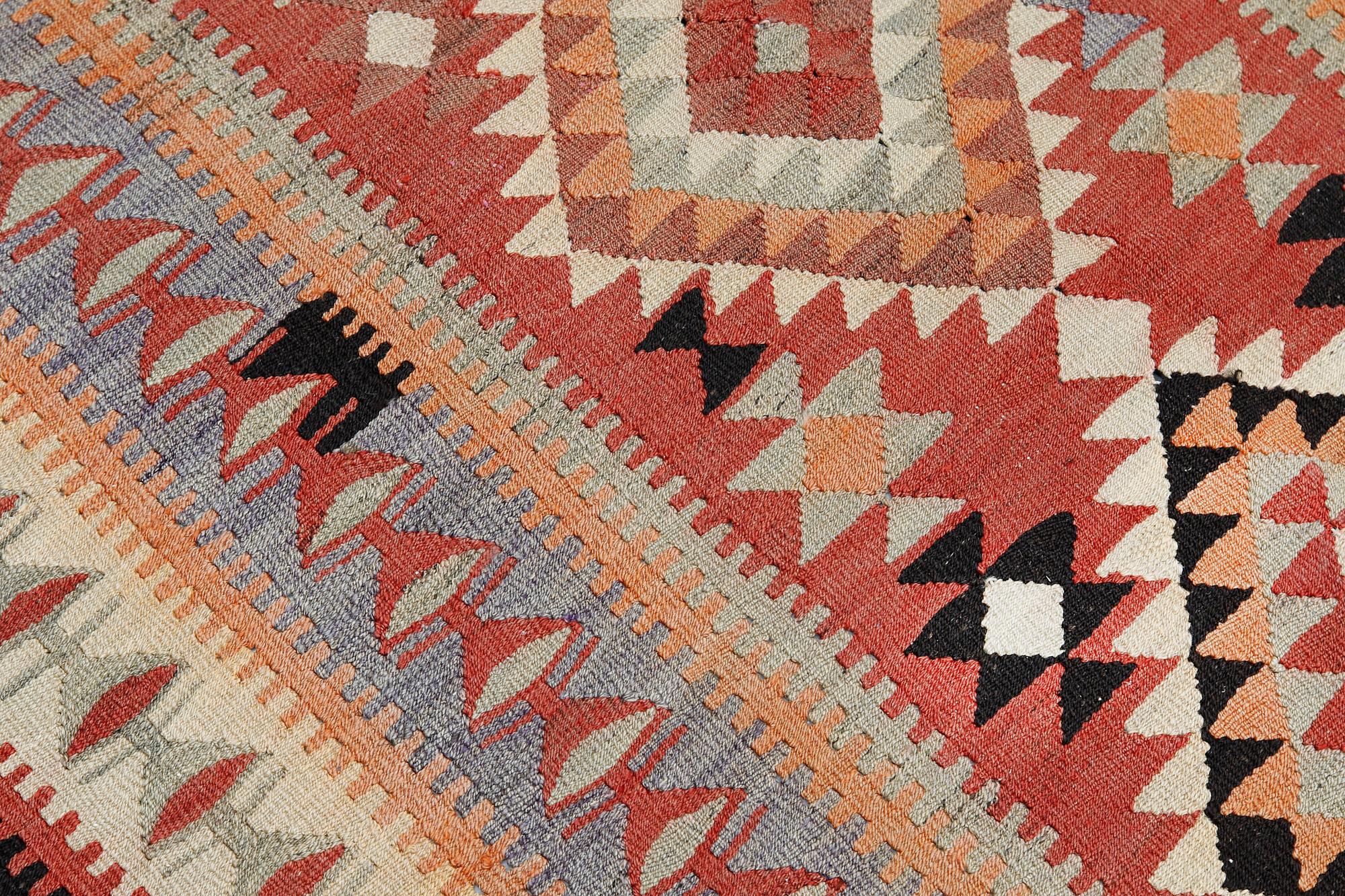 A Nomad Kelim Kord carpet, 230 x 152 cm.