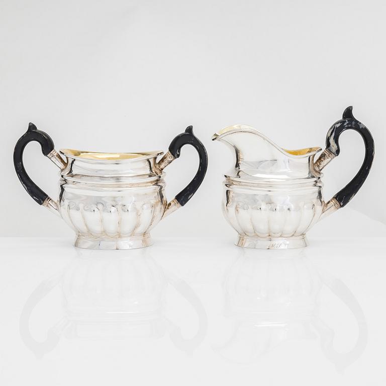 Sugar bowl and cream jug, and four pieces of silver cutlery, Vyborg, Turku, Hämeenlinna and Helsinki 1926-60.
