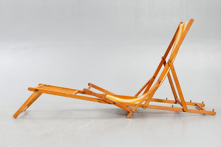 Sun loungers, a pair of footstools, 1950s.