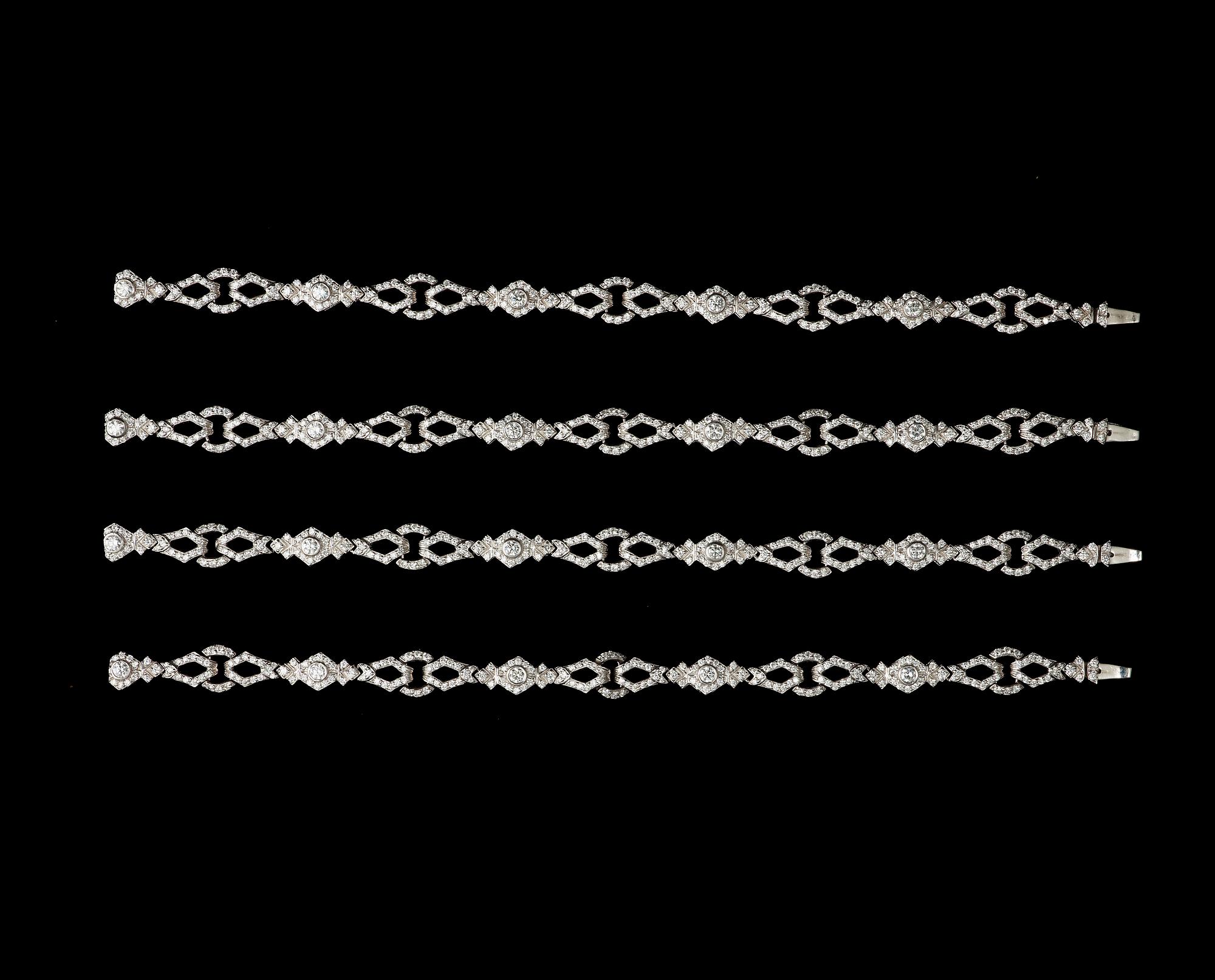 COLLIER, briljantslipade diamanter, tot. 14.20 ct. Itutagbart till collier/ två armband.