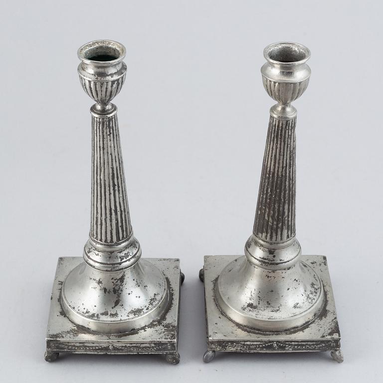 A pair of late gustavian pewter candlesticks by Martin Artedius, Mariestad (master 1808-1838).