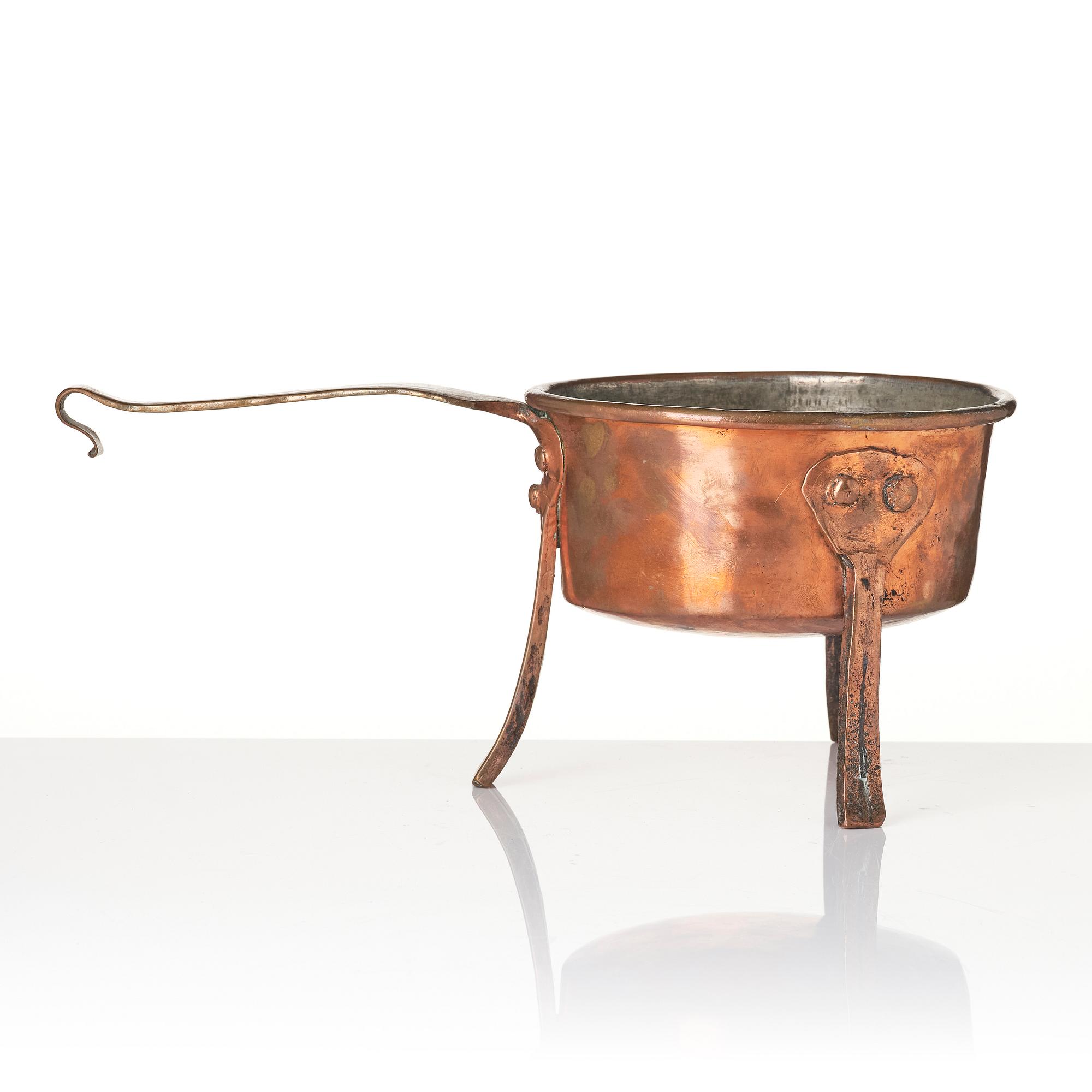 A copper saucepan, 18th century.