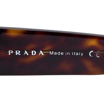 PRADA, a pair of sunglasses.