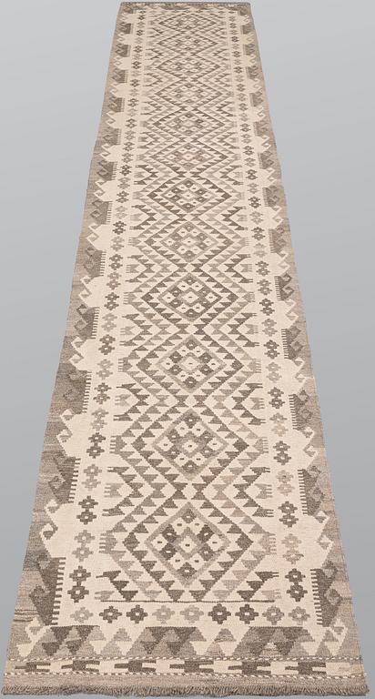 A Kilim runner, approx. 391 x 80 cm.