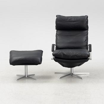 A leather 'SL 330' swivel chair and ottoman, Søren Lund, Denmark.