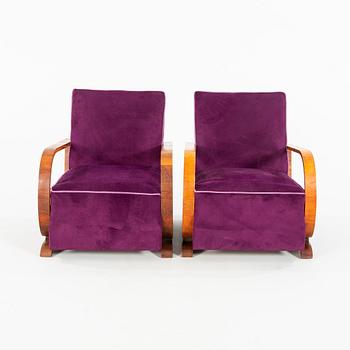 A pair of Art Deco easy chairs from the first half of the 20th century.