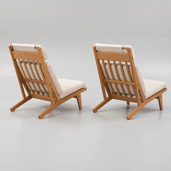 Hans J. Wegner, a pair of "GE375" lounge chairs/sofa, Getama, Denmark, 1970's.