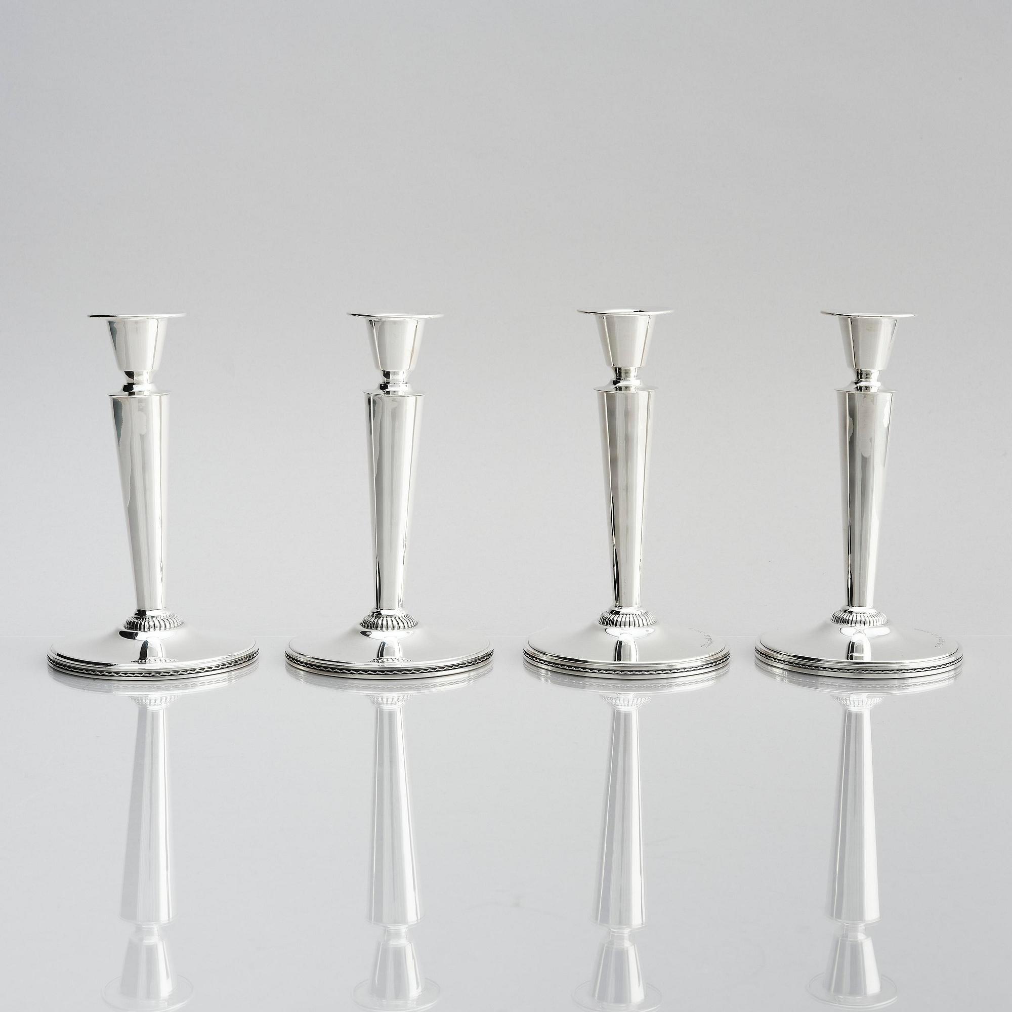 Eric Råström, four silver candlesticks, company CG Råström, Stockholm, Sweden 1965-1973.