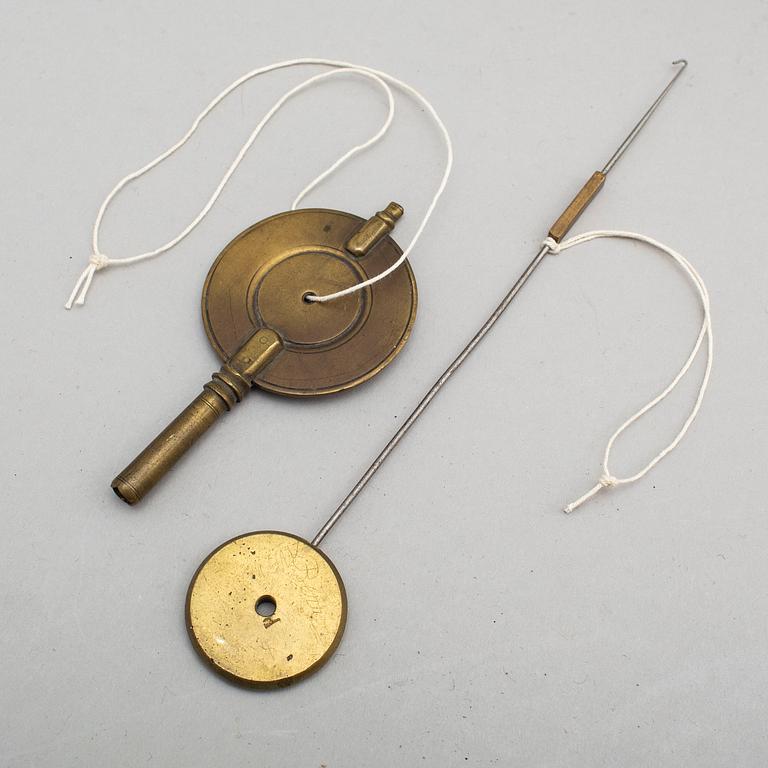 A first half of the 19th century Empire bronze mantle clock.