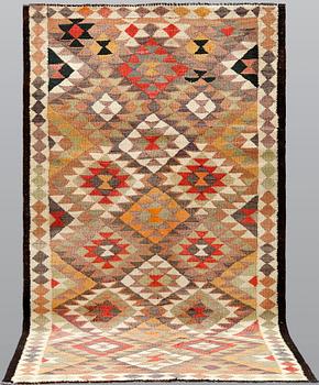 A Nomad Kilim carpet, approx. 265 x 150 cm.