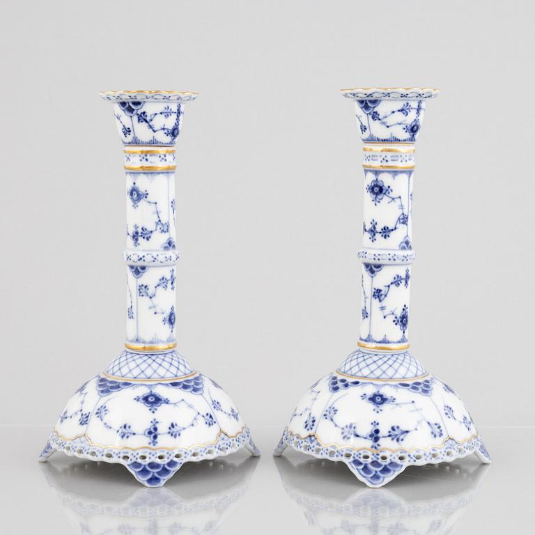 A pair of 'Blue Fluted Full Lace' porcelain Candle sticks, Royal Copenhagen, model number 1008, post 1923.