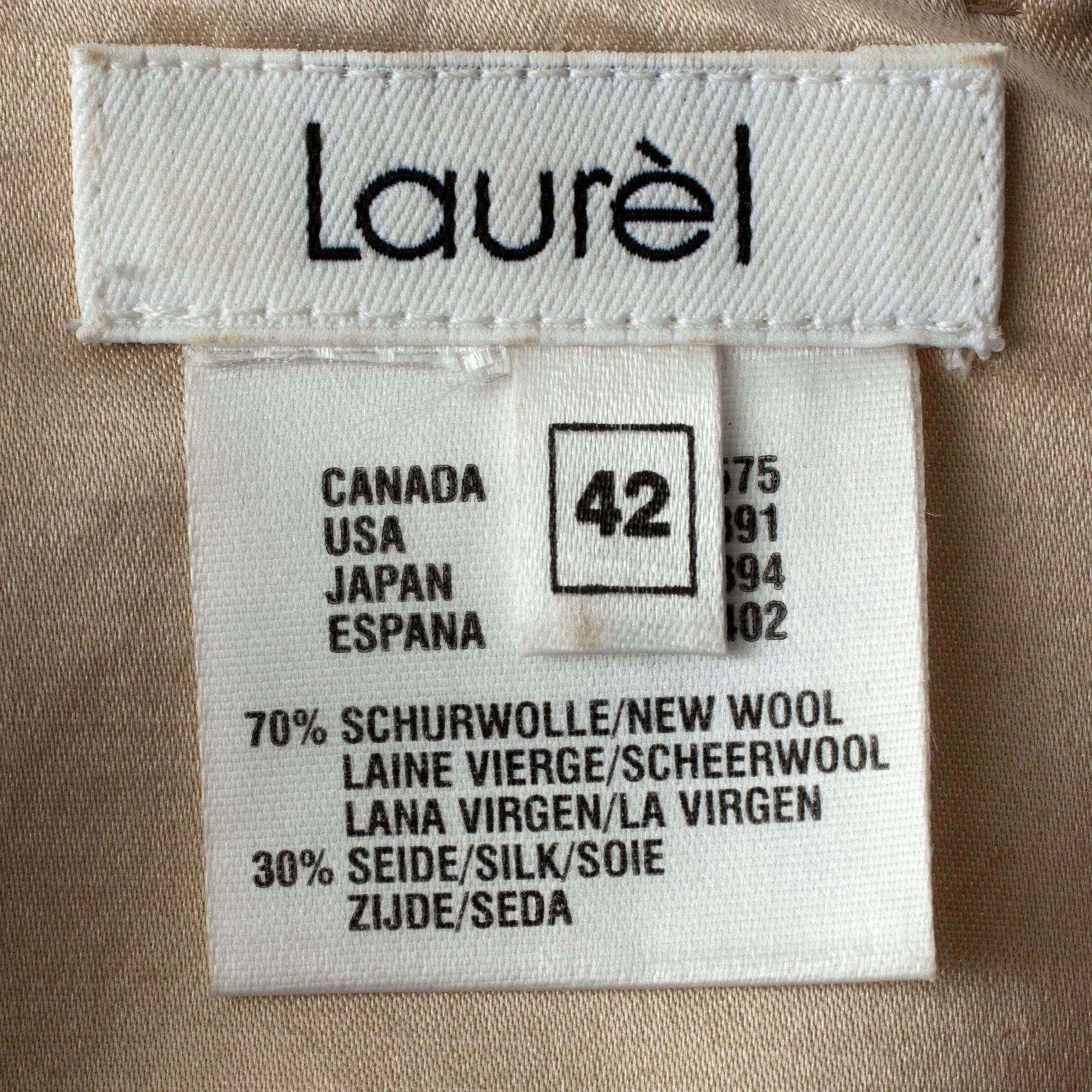 LAURÈL, a wool and silk gold shimmering dress.