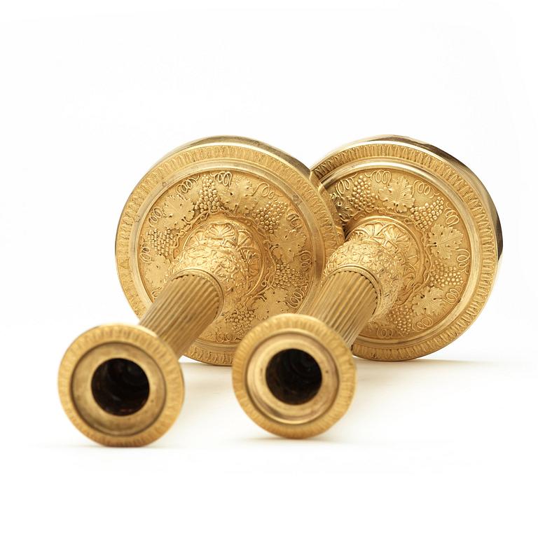 A pair of Empire  early 19th century candlesticks.