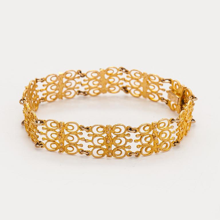 Esko Raitanen, collier, armband och örhängen, 14K guld, Helsingfors 1972.