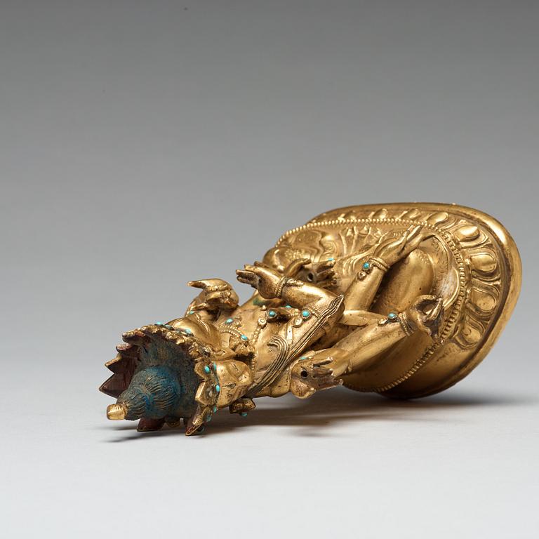 A Sino-Tibetan gilt copper alloy figure of Ushnisha Vinaya, late 18th century/circa 1800.