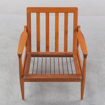 A 1950's/60's teak and oak easy chair.