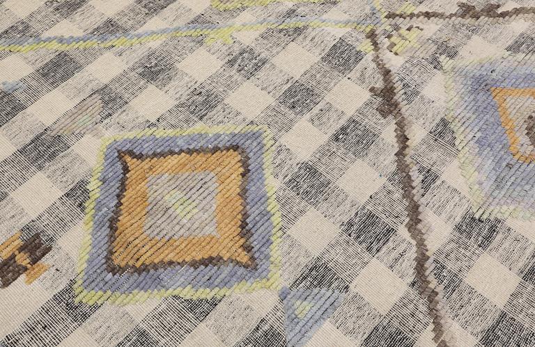 A kilim carpet with relief, 361 x 273 cm.