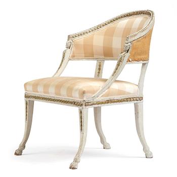 73. A late Gustavian open armchair by E. Ståhl (master in Stockholm 1794-1820).