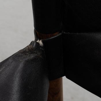 Kristian Solmer Vedel, a pair of "Modus" armchairs and a low table, Søren Willadsen, 1960's.