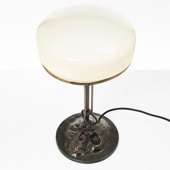 Evard Trulsson, a bronze tablelamp decorated with a skull at the base, Sweden, beginning of the 20th century.
