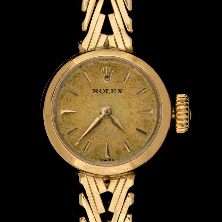 DAMARMBANDSUR, Rolex, Orchid 18k med integrerad länk 14k guld. 1900-talets andra hälft. Tot vikt 19,3g.