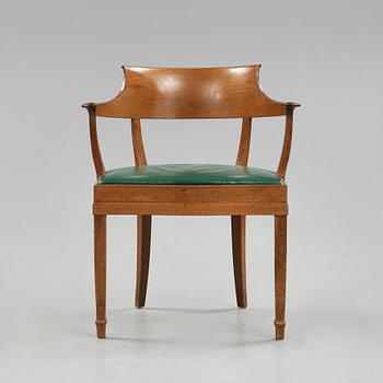 Alfred Grenander, a mahogany and green leather armchair, ca 1905.