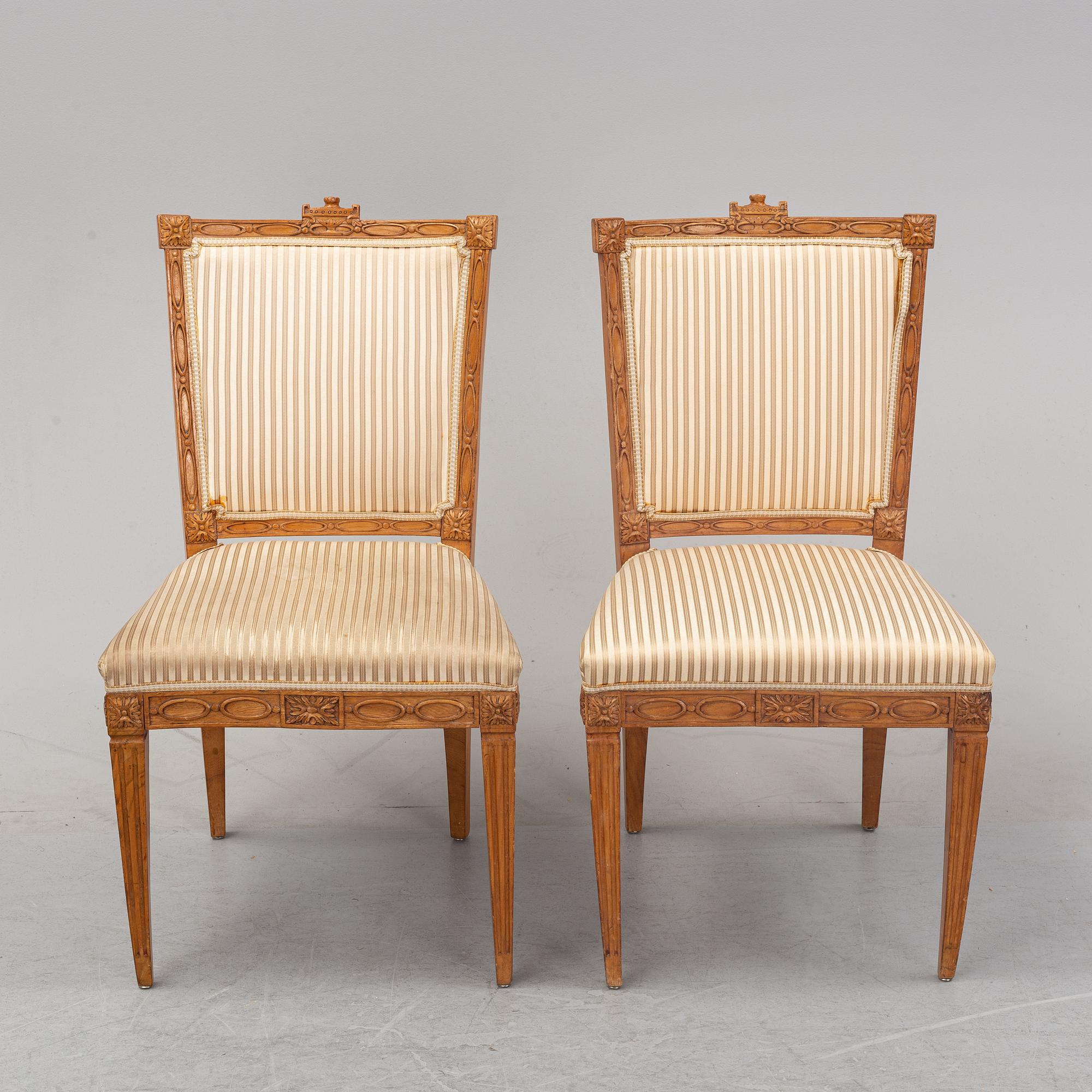 Six Louis XVI style oak chairs from around the year 1900.