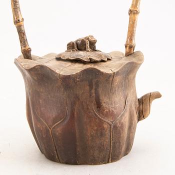 A Chinese early 1900s bamboo tea pot.