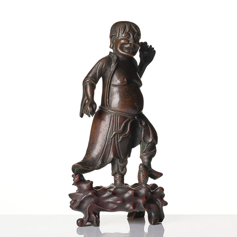 A bronze sculpture of Liu Hai, Qing dynasty, 19th century.