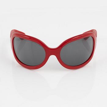 Oliver Goldsmith, a pair of red "Yuhu" sunglasses.
