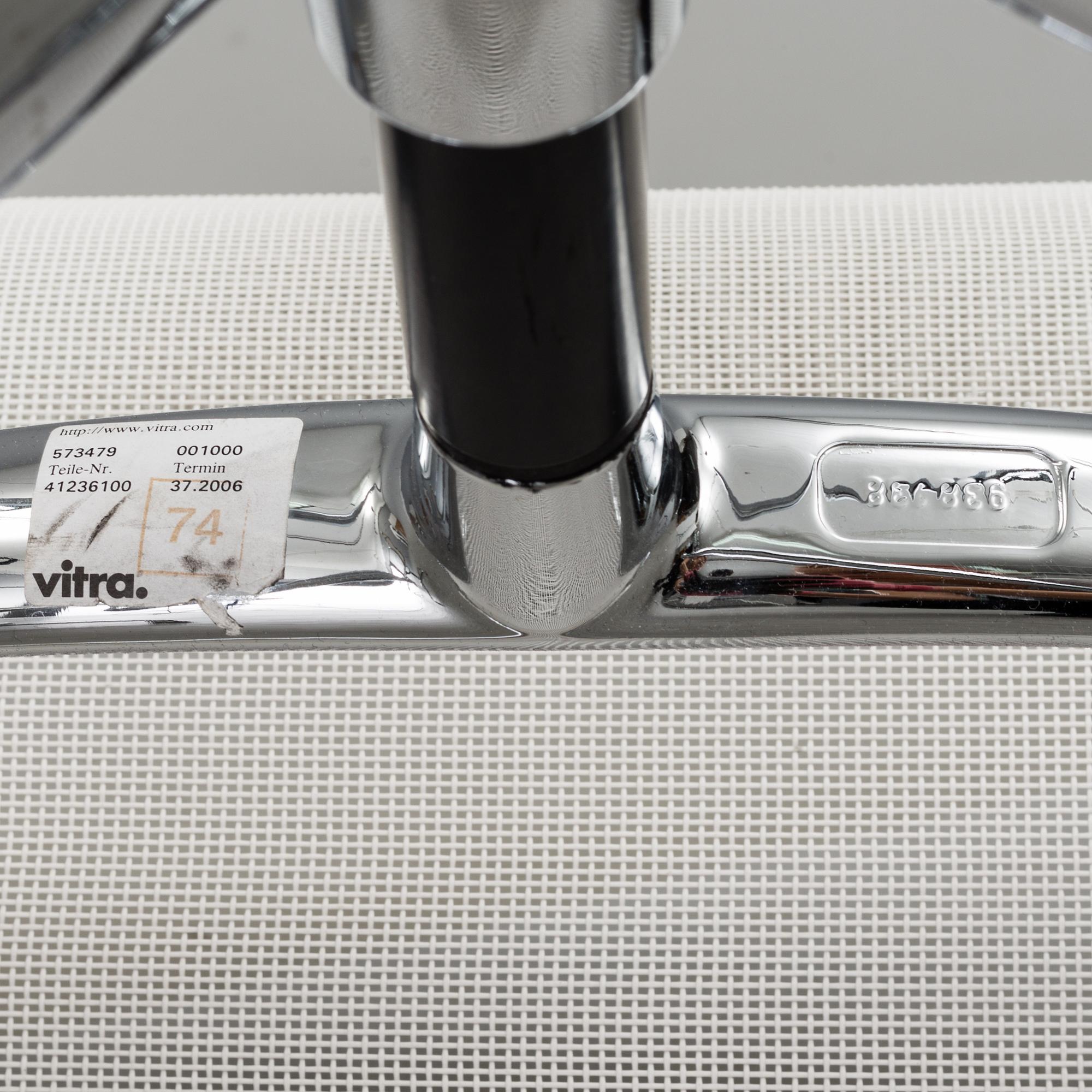 A pair of 'EA 108' desk chairs by Charles & Ray Eames for Vitra.