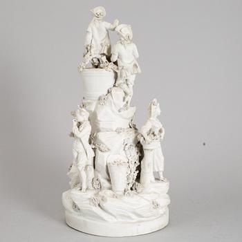 A biscuit porcelain figure group, circa 1900.