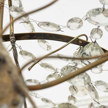 A three-light Gustavian-style hanging light, circa 1900.