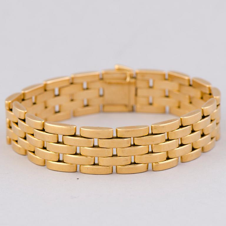 ARMBAND, 18K guld. Cartier, "Maillon Panthere".