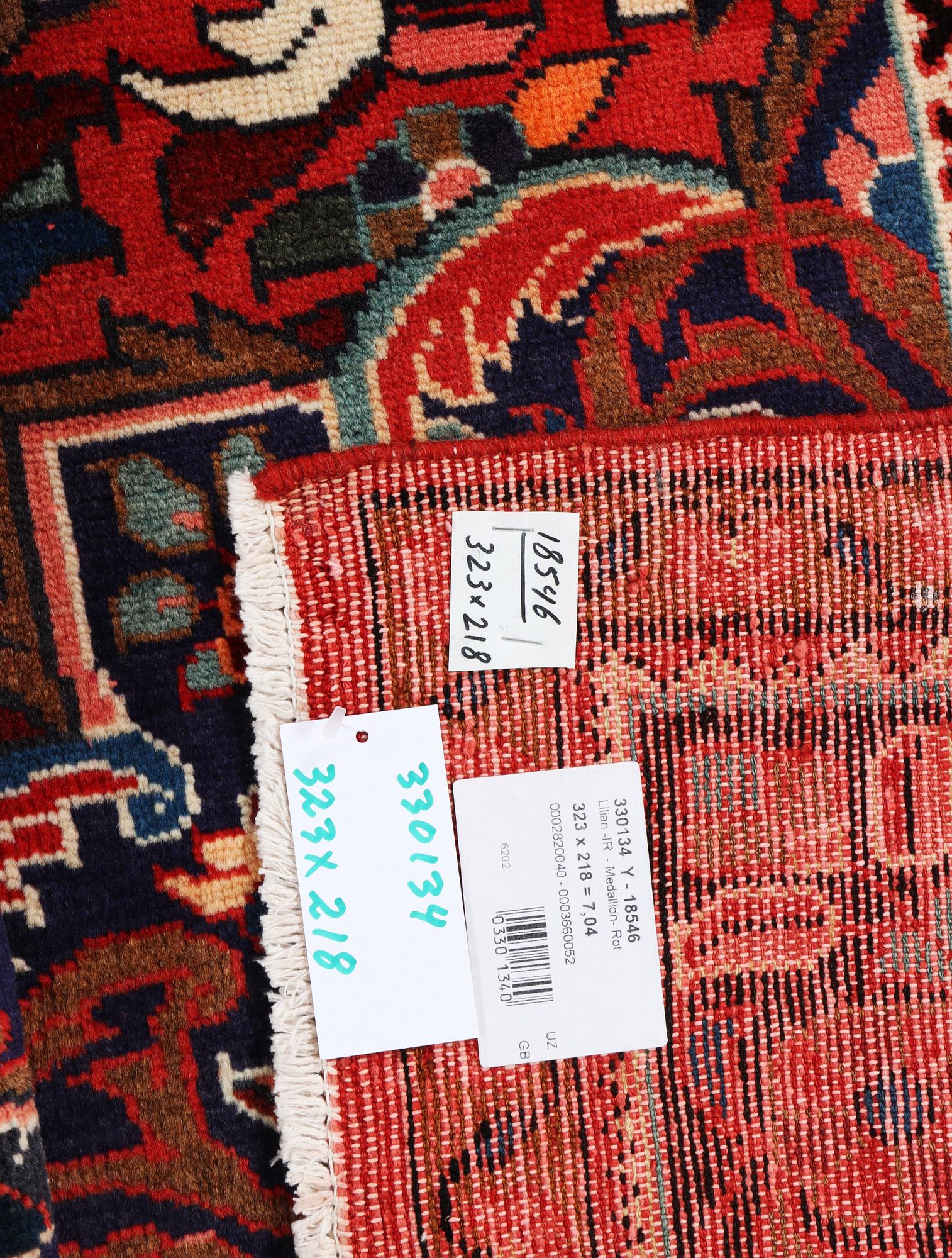 A Lilian carpet, c. 323 x 218 cm.