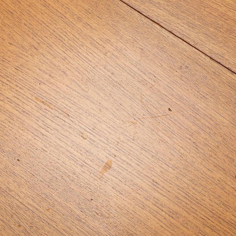 A mid20th century gate-leg table.