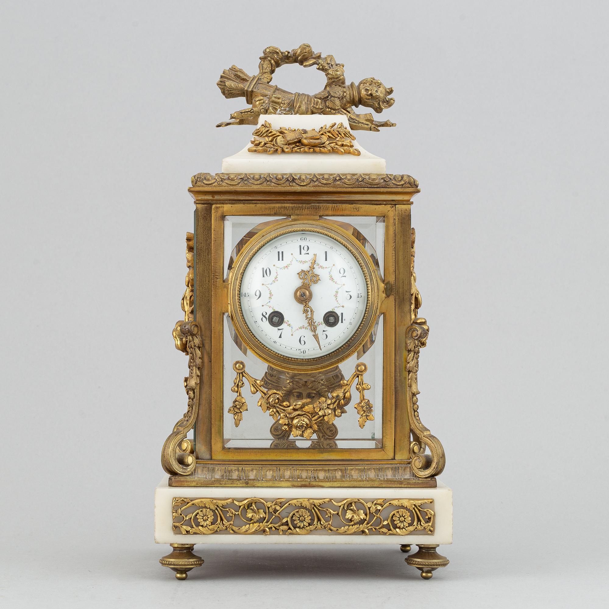 A circa 1900 Louis XVI-style mantle clock.