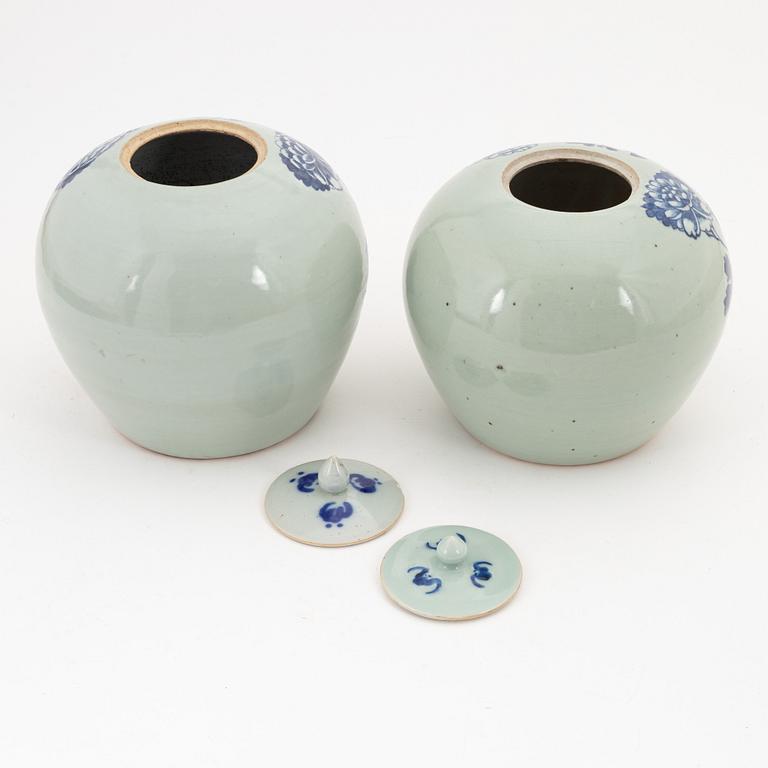 A Chinese a near pair of jars with cover, 20th Century.