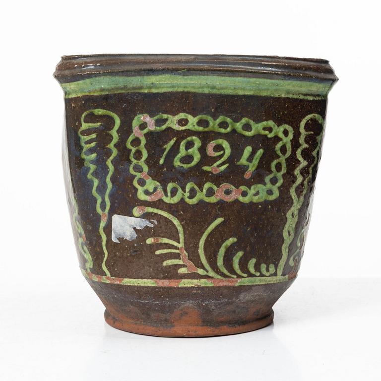 Stoneware planter and stand, dated 1824.