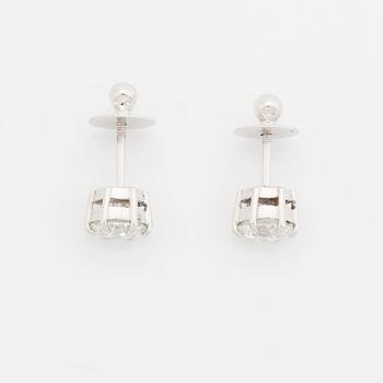 A pair of platinum earrings set with round brilliant-cut diamonds total weight 2.00 cts D if (internally flawless).