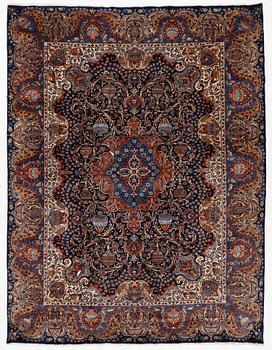 A Kashmar rug, c. 396 x 300 cm.