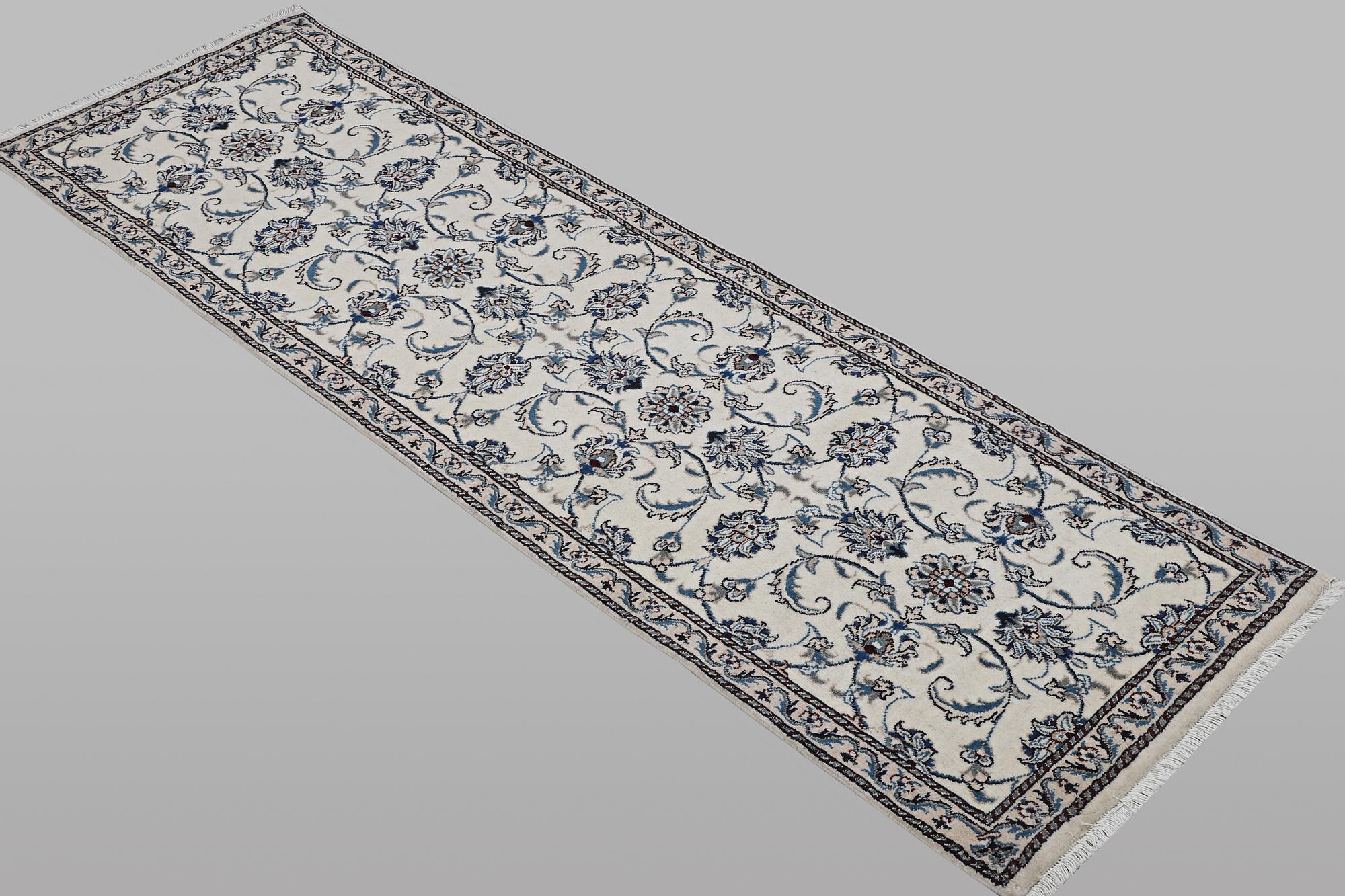 A runner carpet, Nain, part silk, ca 248 x 72 cm.